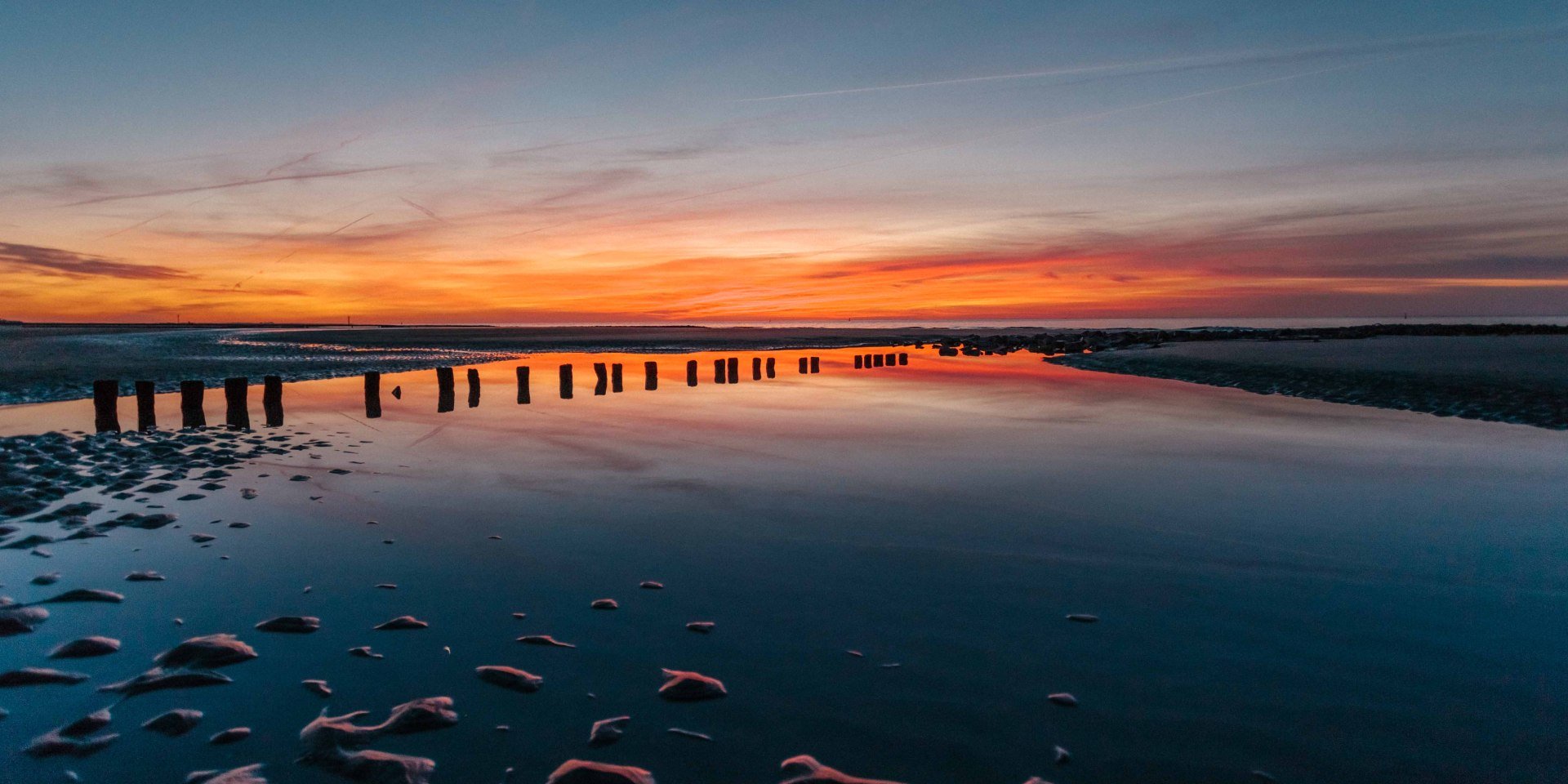 Sonnenuntergang im Wattenmeer vor Norderney, © Janis Meyer