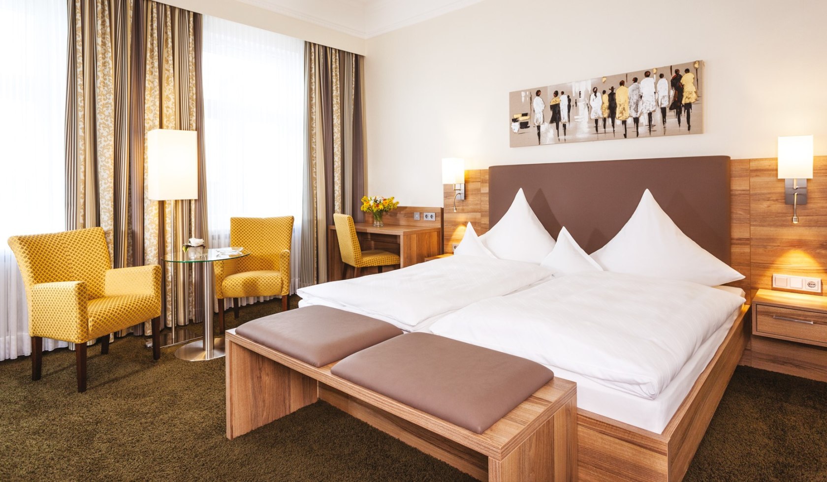 Blick auf ein Doppelbett in einem Zimmer des Hotels, © Hotel Noltmann-Peter